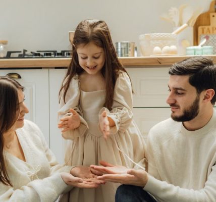 A cheerful family enjoying baking time in their cozy kitchen, fostering love and togetherness.